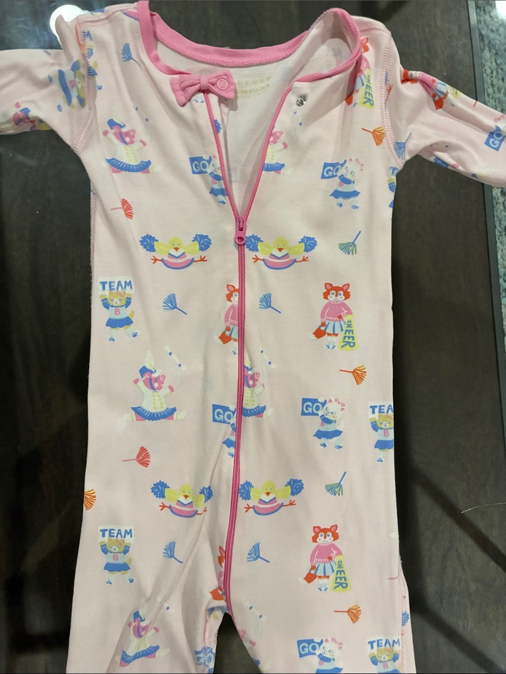 Baby Pink Zip-Front One-Piece Pajamas with Cheerful Character Print